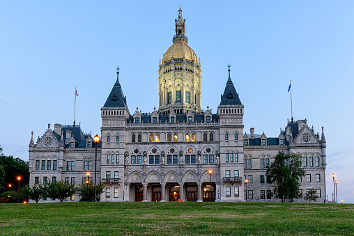 Connecticut State Capitol Building with lights turned on after sunset