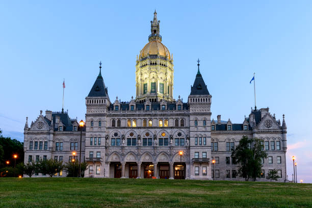 istock Connecticut State Capitol Building with lights turned on 1171977421