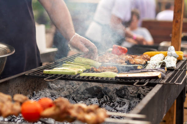 istock Cook cooks grilled vegetables on the grill 1171977529