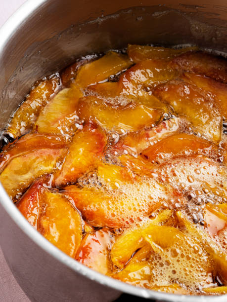 Peach jam, Cooking Peach marmalade,jam background, Peach Fruit, Breakfast, Burner - Stove Top, Close-up, Compote,	saucepan,Preserves, Seed compote stock pictures, royalty-free photos & images