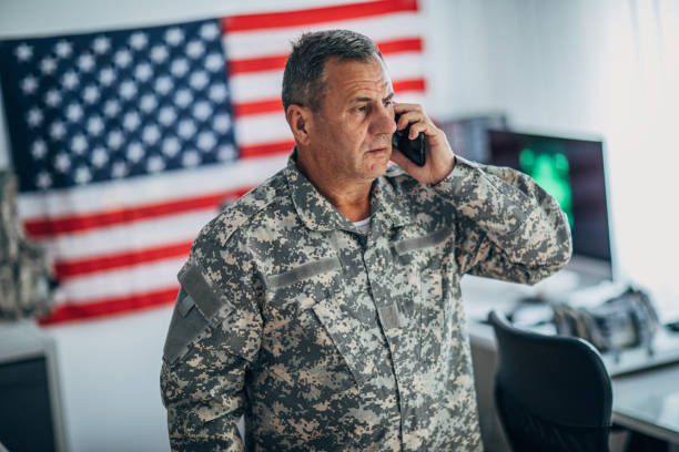 istock Senior soldier talking on smart phone 1171982594