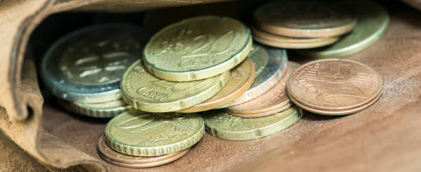 istock Money retirement concept, euro cent coins, web banner 1171985299