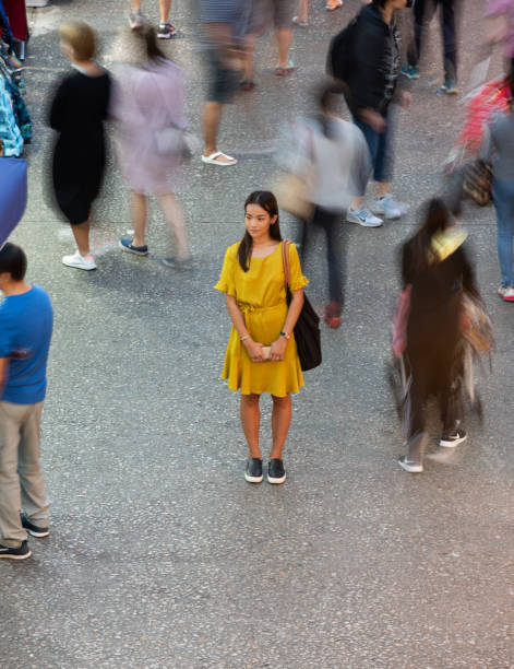 istock Woman using phone, motioned blurred market 1171987686
