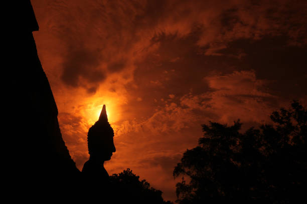 a buddha at the Wat Mahathat Temple at the Historical Park in Sukhothai in the Provinz Sukhothai in the north of Bangkok in Thailand, Southeastasia.  Thailand, Sukhothai, October, 2012