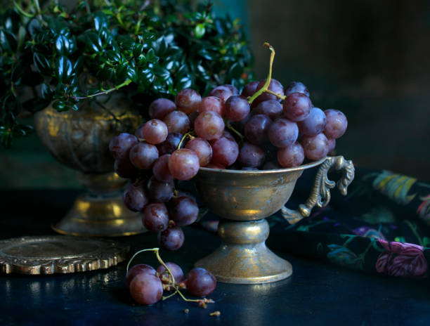 istock bunch of ripe grapes in a bronze bowl 1171995484