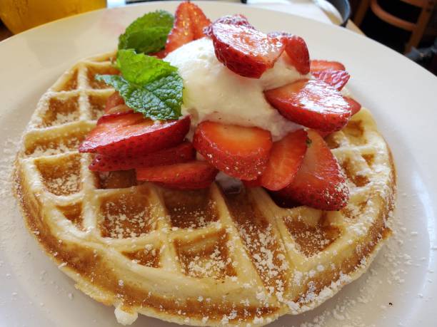 istock Belgian Waffle With Strawberries And Whipped Cream 1171995742