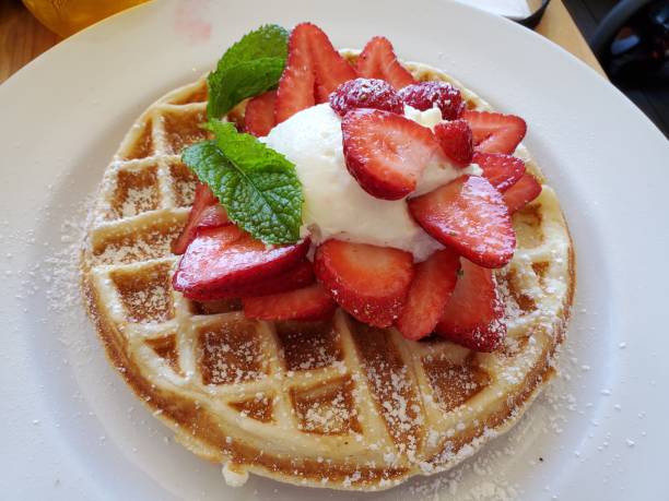 istock Belgian Waffle With Strawberries And Whipped Cream 1171995775