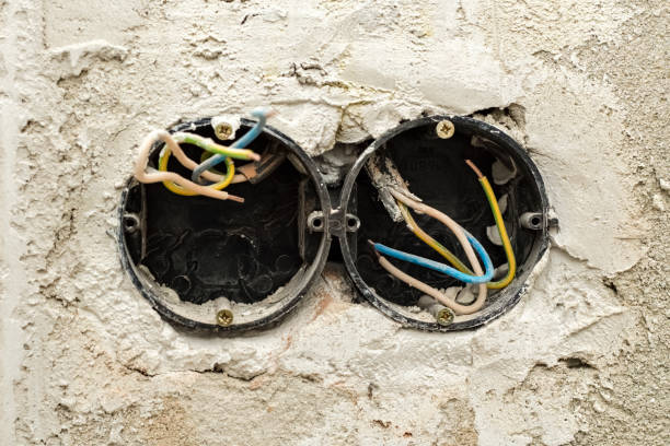 istock Installing double sockets. Attached to the outlet using gypsum plaster 1171999662