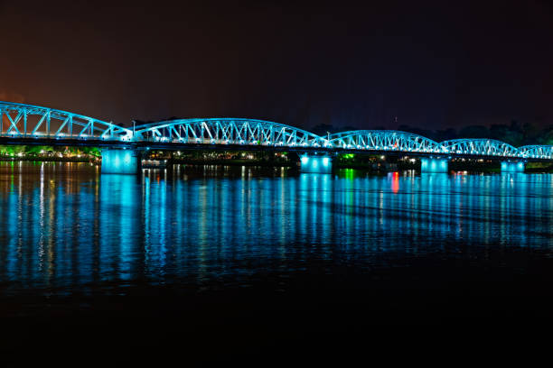 istock Night scene of a bridge in blue lights 1172007150