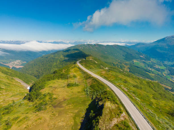 istock Road trough mountains Norway. Aerial view 1172009170