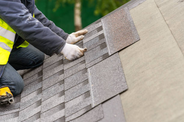 istock Workman install tile on roof of new house under construction 1172013284
