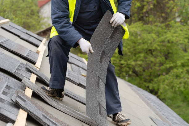 istock Workman install tile on roof of new house under construction 1172013732