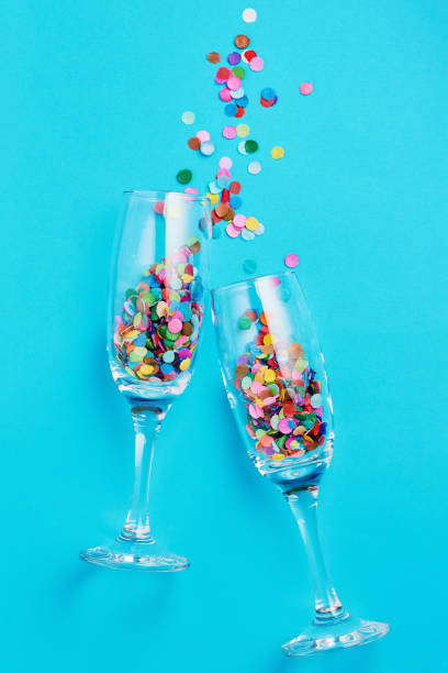 confetti remains with blurry feet in the background, good for background