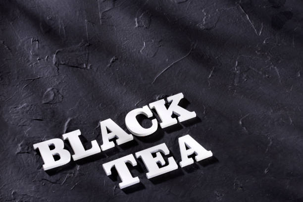 istock Word black tea in wood letters - Camellia sinensis 1172015472