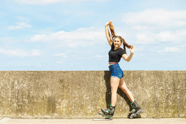 istock Fit girl with roller skates outdoor 1172015606