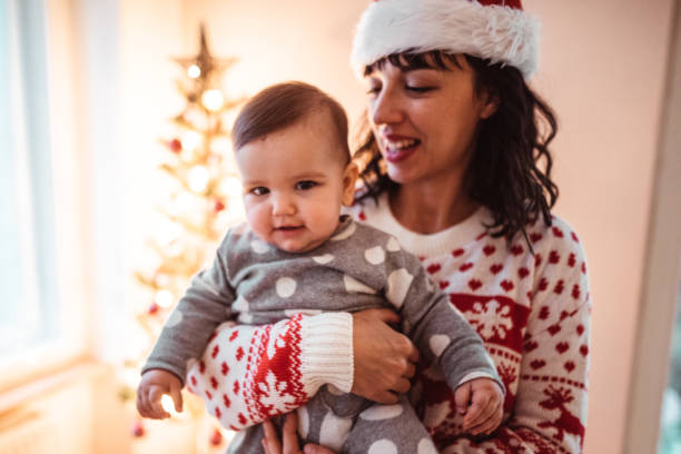 istock little kid playing with the mother for christmas 1172017878