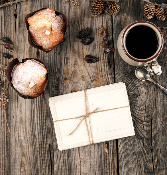 istock ropeed old paper postcards and ceramic mug with black coffee 1172018702
