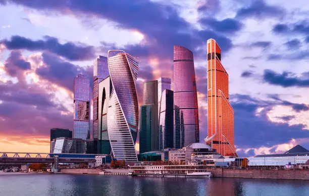 International Moscow City business center with light reflections in Moscow river