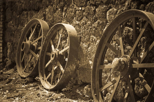 Pile of used bicycle wheels in an abandoned garbage dump
