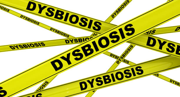 istock Dysbiosis. Yellow warning tapes 1172042404