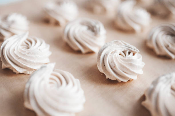 istock Homemade marshmallows on parchment paper. 1172043779
