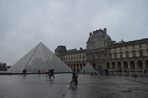 Artistic and beautiful and famous Louvre Museum pyramid in Paris France
