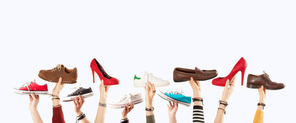 hands up with many shoes