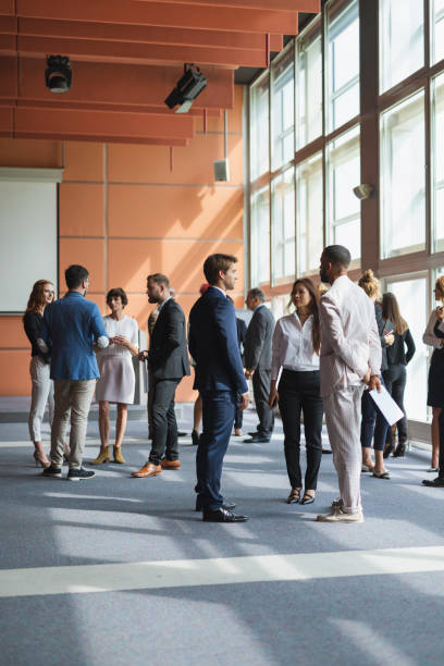 Business people attending a conference