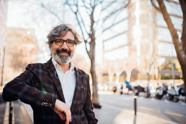 istock Older man wearing headphones 1172046094