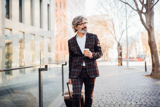 istock Mature guy walking down the street 1172046179
