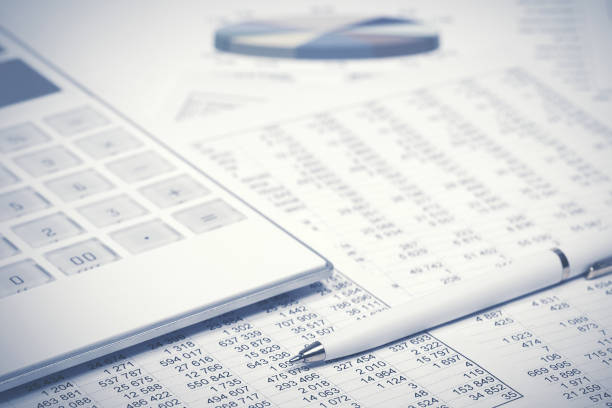 istock Financial accounting pen and calculator on balance sheets 1172053803
