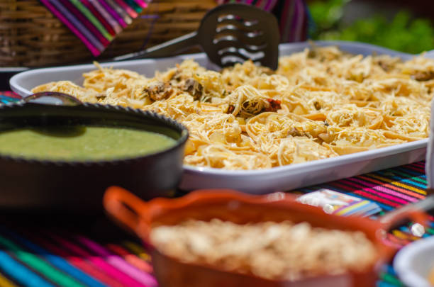 Chalupas served on a tray for a mexican buffet party stock photo