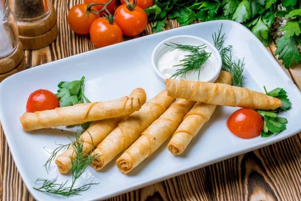 istock sigara Burek on wooden table Turkish cuisine 1172064882