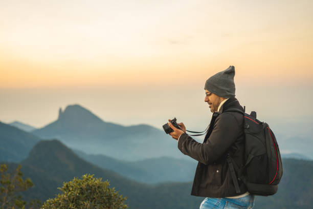istock Backpacker photographing the best moments 1172064890