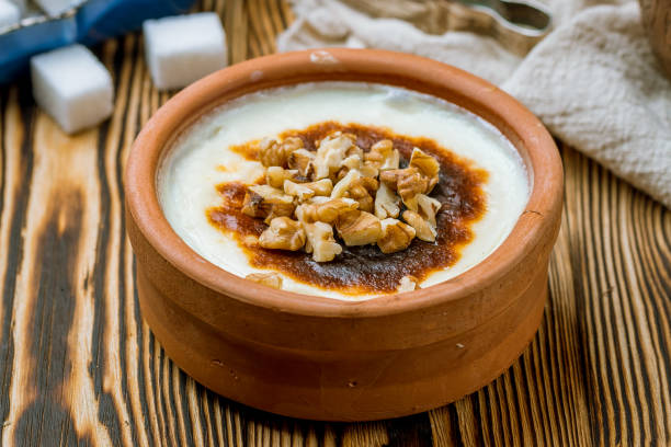istock sutlac with nuts on wooden table. Turkish cuisine. 1172065110