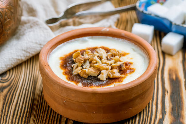 istock sutlac with nuts on wooden table. Turkish cuisine. 1172065914