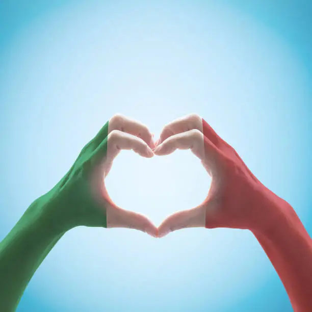 Photo of Italy National flag pattern  on hand heart shape.