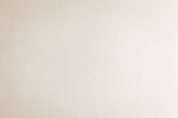 istock Beige silk fabric wallpaper texture background in light white cream 1172072406