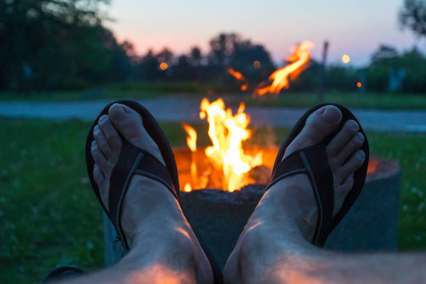 istock Relaxing by the Bonfire in Camping in Summer 1172076008