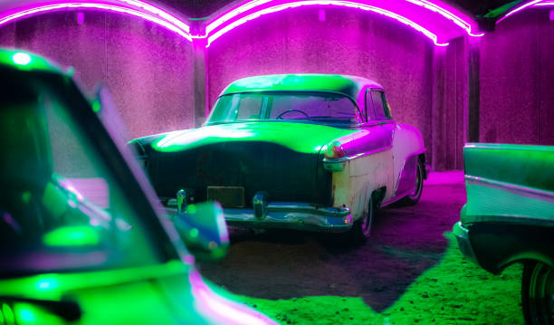 istock Antique Car Under Neon Lights 1172076531