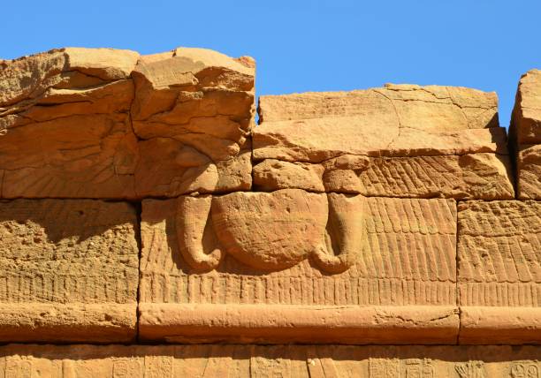 istock Temple of Amun - hypostyle hall eastern gate - winged sun disk with uraeus, Naqa, Northern State, Sudan - UNESCO World Heritage Site (island of Meroe) 1172083363
