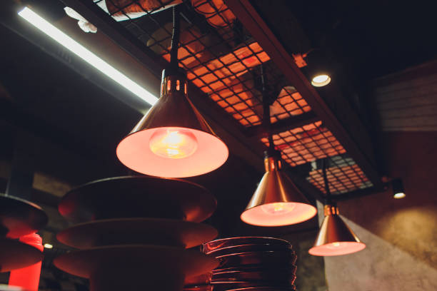 istock Beautiful chandelier. Modern chandelier hanging under ceiling. 1172084722