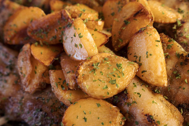 istock potatoes from the oven with parsley close-up 1172085262