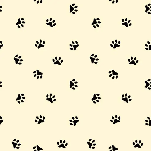 Vector illustration of Seamless black animal footprint pattern on cream background vector.