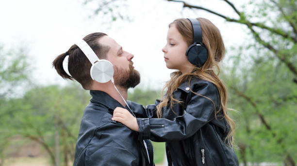 istock Dad and daughter walk around the city 1172094869