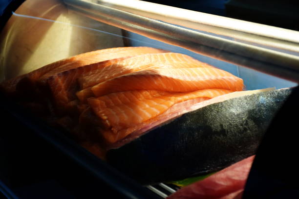 istock Fresh Raw Salmon Pieces In Supermarket shelf 1172107741