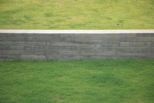 Concrete walls in the lawn