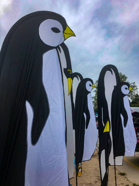istock Cute penguin flags at kite festival 1172115520