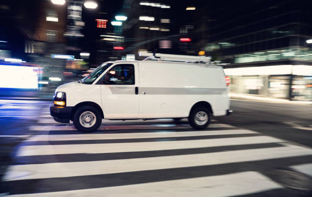 istock White delivery van in Manhattan New York at night 1172119605