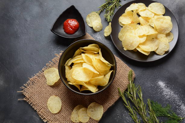 istock Bowl of crispy home made potato chips 1172124125